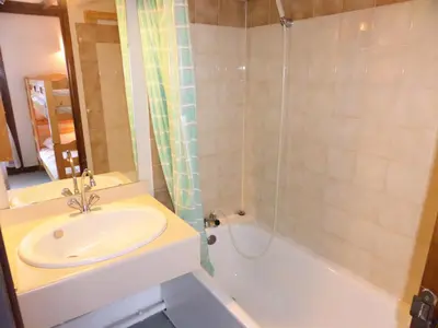 a bathroom with a sink and a toilet and a shower at Résidence Schuss - Schuss B230 MAE-5335 in Les Contamines-Montjoie