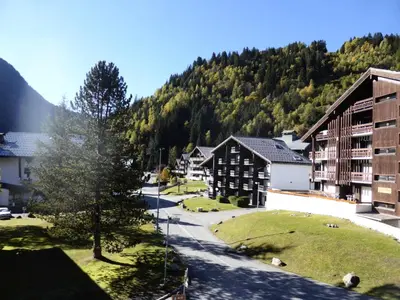 a view of a town with buildings and a mountain at Résidence Rochasset - Rochasset D75 MAE-5345 in Les Contamines-Montjoie