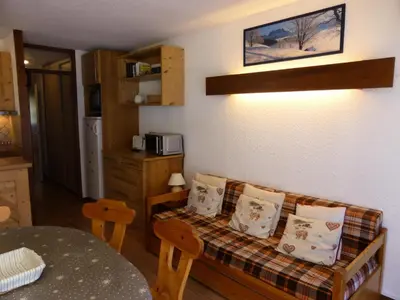 a living room with a couch and a table at Résidence Rochasset - Rochasset D75 MAE-5345 in Les Contamines-Montjoie
