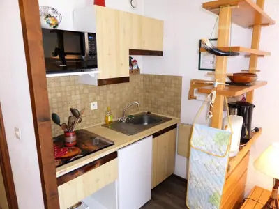 a small kitchen with a sink and a microwave at Résidence Le Brulaz - Brulaz F1E MAE-5347 in Les Contamines-Montjoie