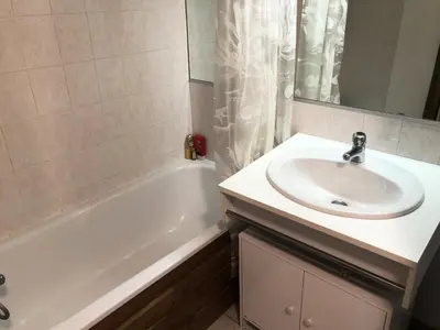 a bathroom with a sink and a bath tub and a sink at Résidence Les Cimes D'or A - Cimes d'Or A337 MAE-5349 in Les Contamines-Montjoie