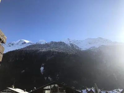 a view of a mountain with snow covered mountains at Résidence Le Brulaz - Brulaz F26 MAE-5350 in Les Contamines-Montjoie