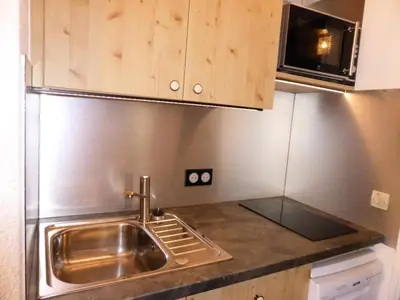 a kitchen with a sink and a microwave at Résidence Combettes - Combettes E308 MAE-5352 in Les Contamines-Montjoie