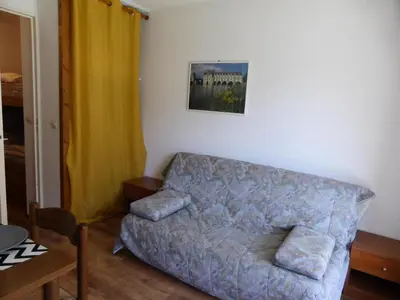 a living room with a couch and a table at Résidence L'enclave - Enclave I638 MAE-5354 in Les Contamines-Montjoie