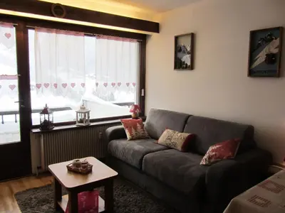 a living room with a couch and a table at Résidence Bionnassay - Bionnassay B159 MAE-5357 in Les Contamines-Montjoie