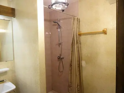 a shower in a bathroom with a glass door at Résidence Bionnassay - Bionnassay B159 MAE-5357 in Les Contamines-Montjoie
