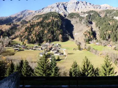 a village in a valley with mountains in the background at Résidence Bionnassay - Bionnassay B159 MAE-5357 in Les Contamines-Montjoie