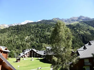 a view of a resort with mountains in the background at Résidence Borgia - Borgia A19 MAE-5359 in Les Contamines-Montjoie