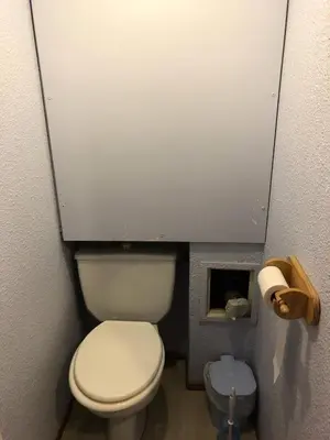 a small bathroom with a white toilet in a stall at Résidence Borgia - Borgia A3 MAE-5367 in Les Contamines-Montjoie