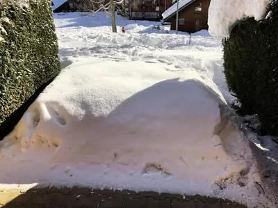 a pile of snow with a cat imprint in it at Résidence Borgia - Borgia A3 MAE-5367 in Les Contamines-Montjoie
