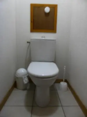 a small bathroom with a toilet and a window at Résidence Le Grand Panorama - Grand Panorama 115 MAE-5286 in Saint-Gervais-les-Bains