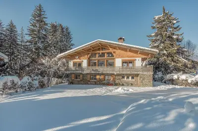 a log home in the snow at Chalet Nepal in Megève