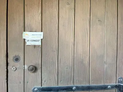 a wooden fence with a sign on it at Duplex à Megève, 6 Couchages, Proche Centre et Pistes - FR-1-597-4 in Megève