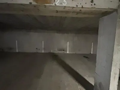 an empty room with a concrete floor and a wall at Appart 2 pièces + mezzanine, 6 couchages, Megève, parking - FR-1-597-7 in Megève