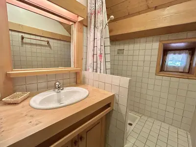 a bathroom with a sink and a shower at Confortable Duplex 3 Pièces, 6 Couchages, Proche Centre et Télécabine, Balcon Sud, Megève - FR-1-597-8 in Megève
