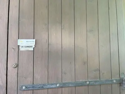 a wooden fence with a sign on it at Confortable Duplex 3 Pièces, 6 Couchages, Proche Centre et Télécabine, Balcon Sud, Megève - FR-1-597-8 in Megève