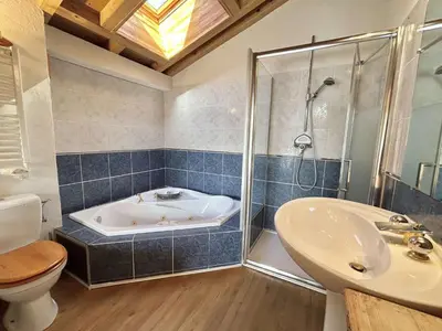 a bathroom with a tub and a toilet and a sink at Appartement Duplex 2 pièces, 4 couchages, proche pistes de ski, garage, Demi-Quartier - FR-1-597-16 in Demi-Quartier