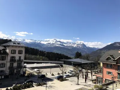 a view of a city with buildings and a church at Résidence Paradiso - Paradiso B2 MAE-5224 in Saint-Gervais-les-Bains