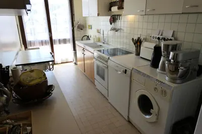 a living room with a couch and a table at Résidence Paradiso - Paradiso B2 MAE-5224 in Saint-Gervais-les-Bains