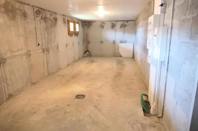 an empty room with a concrete floor in a building at Chalet Granier - Chalet Granier MAE-5234 in Saint-Gervais-les-Bains