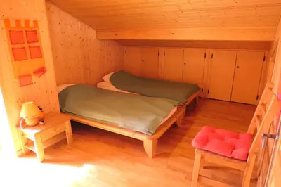 a small room with two beds in a cabin at Chalet Granier - Chalet Granier MAE-5234 in Saint-Gervais-les-Bains