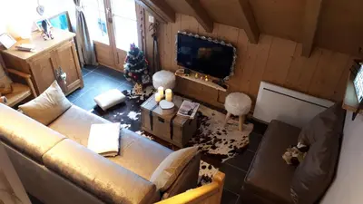 an overhead view of a living room with a couch at Duplex 6 pers, garage, WIFI, calme, proche des pistes, vue magnifique in Saint-Gervais-les-Bains