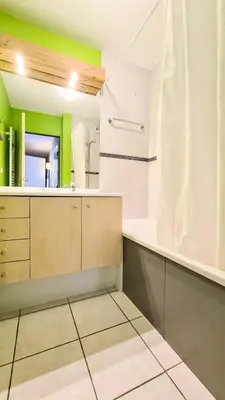 a bedroom with two bunk beds and a sliding door at Résidence Les Pleiades - Appartement spacieux et lumineux · Centre station · Balcon · Parking couvert MAE-7355 in Flaine
