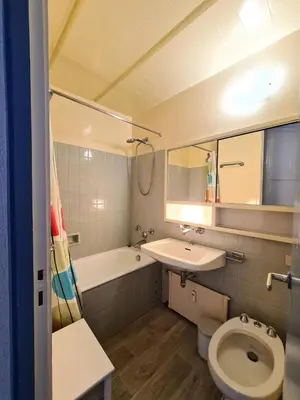 a bathroom with a toilet and a sink and a tub at Résidence Betelgeuse - Appartement rénové · Proche des pistes et des commerces · Balcon MAE-7361 in Flaine