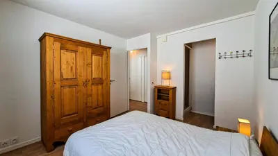 a white bathroom with a tub and a sink at Résidence La Petite Ourse - Appartement neuf · Centre station MAE-7370 in Flaine