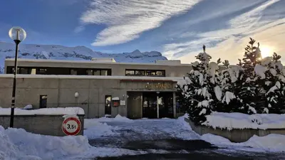 a building with snow in front of it at Résidence Les Pleiades - Appartement lumineux · Centre station · Balcon · Parking couvert MAE-7373 in Flaine