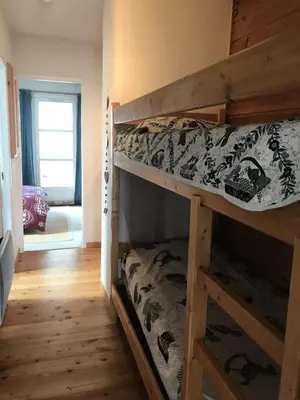 a bedroom with two bunk beds in a room at Résidence Chateaux De Crans - Appartement confortable · Balcon MAE-7375 in Flaine