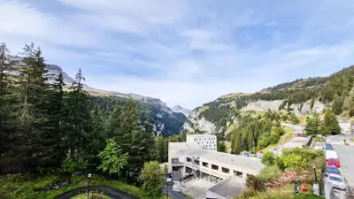 a view of a mountain with a building at Résidence Betelgeuse - Appartement rénové · Entre pistes et commerces · Balcon MAE-7382 in Flaine
