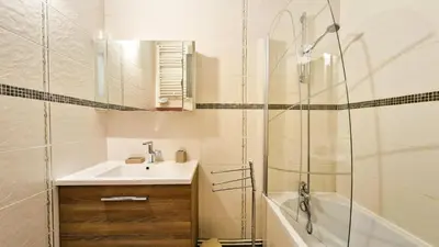 a bathroom with a sink and a shower at Résidence Belier - Appartement confortable et lumineux · Au pied des pistes · WIFI gratuit et illimité MAE-7384 in Flaine
