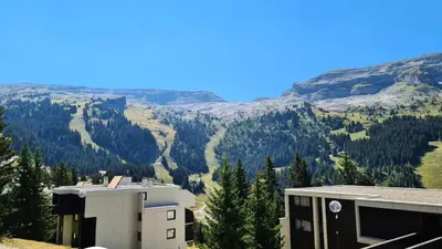 a building with a view of a mountain at Résidence Andromede - Studio confortable · Entre pistes et commerces · Balcon MAE-7395 in Flaine