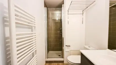 a bathroom with a shower and a toilet and a sink at Résidence La Petite Ourse - Studio neuf · Centre station · Balcon MAE-7402 in Flaine