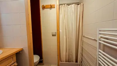 a bathroom with a shower and a toilet at Résidence Arche - Studio confortable · Centre station · Terrasse MAE-7414 in Flaine