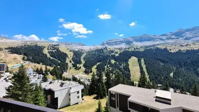a view of the mountains from a building at Résidence Andromede - Studio lumineux · Proche des pistes · Balcon avec jolie vue MAE-7419 in Flaine