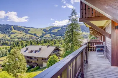 a balcony with a view of the mountains at Appartement Eskimo in Megève