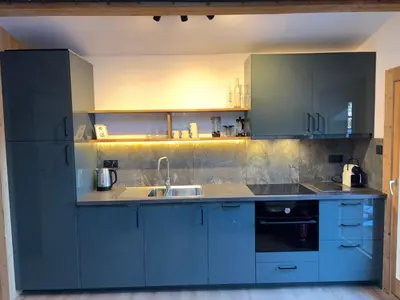 a group of people are doing yoga on the sidewalk at Penthouse Apartment, 3 Bedroom with Private Balcony in Chamonix-Mont-Blanc