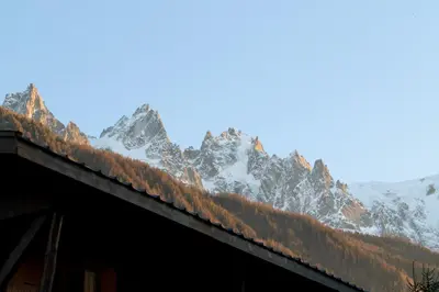 a room with a window and a wooden wall at Experience Mont Blanc with your family in Chamonix-Mont-Blanc