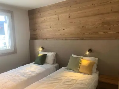 two beds sitting next to each other in a room at Résidence Les Planes - Planes 2 MAE-5206 in Saint-Gervais-les-Bains