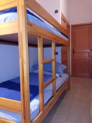 a couple of bunk beds in a room at Spacious and comfortable chalet apartment. in Saint-Gervais-les-Bains