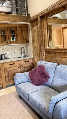 a room with two bunk beds in a house at Oree Studio Mezzanine in Megève