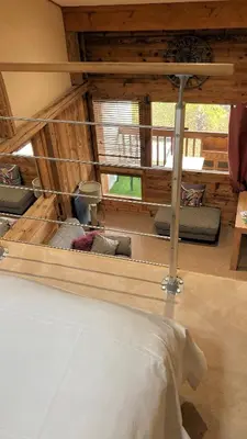 a hallway leading to a living room with a couch at Oree Studio Mezzanine in Megève