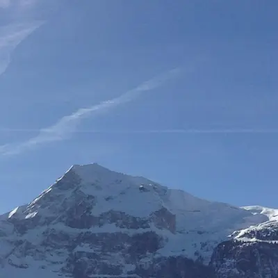 a mountain with snow on top of it at Les Carroz Alpine Chalet - central in Les Carroz d'Araches
