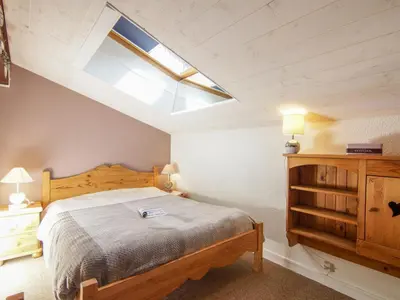 a living room with a table and a couch at Apartment Le Chailloud-2 by Interhome in Chamonix-Mont-Blanc