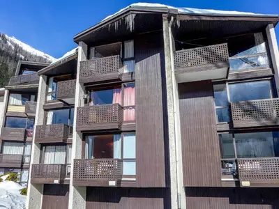 a building with balconies on the side of it at Studio Lognan-1 by Interhome in Chamonix-Mont-Blanc