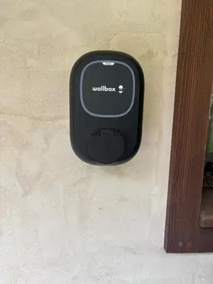 a black box on the side of a wall at Chalet du grand cerf in Servoz
