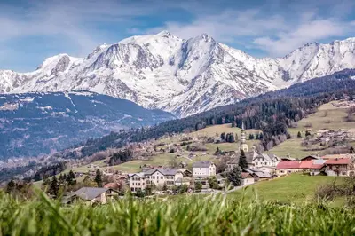 a town in a valley with mountains in the background at Apartment Mont du Soleil - Central Chamonix Mont Blanc in Chamonix-Mont-Blanc