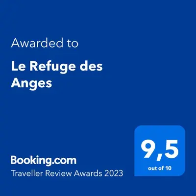 a blue phone screen with the text awarded to le refuge des arrays at Le Refuge des Anges in Megève